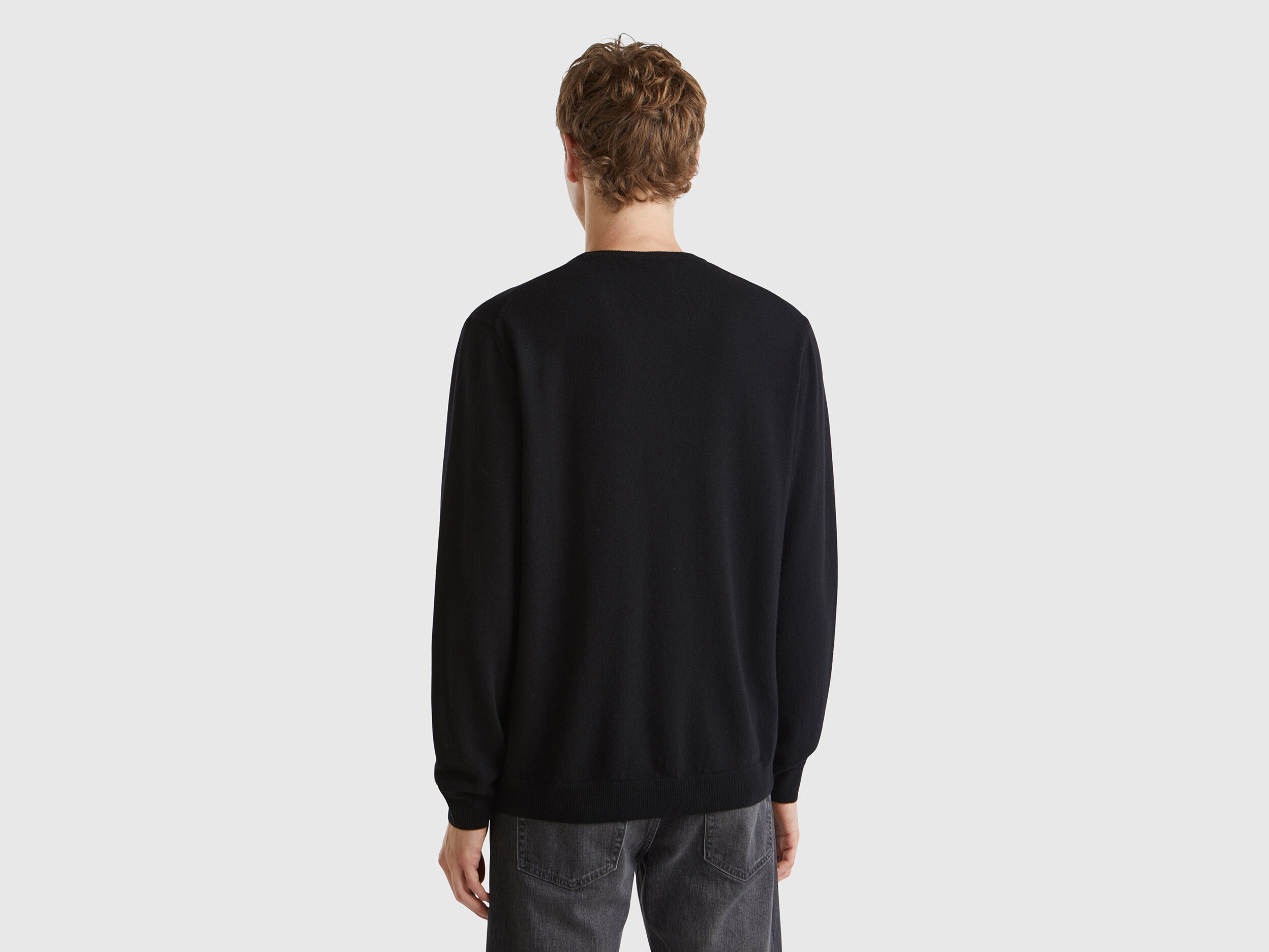 Black sweater in pure Merino wool - Black | Benetton
