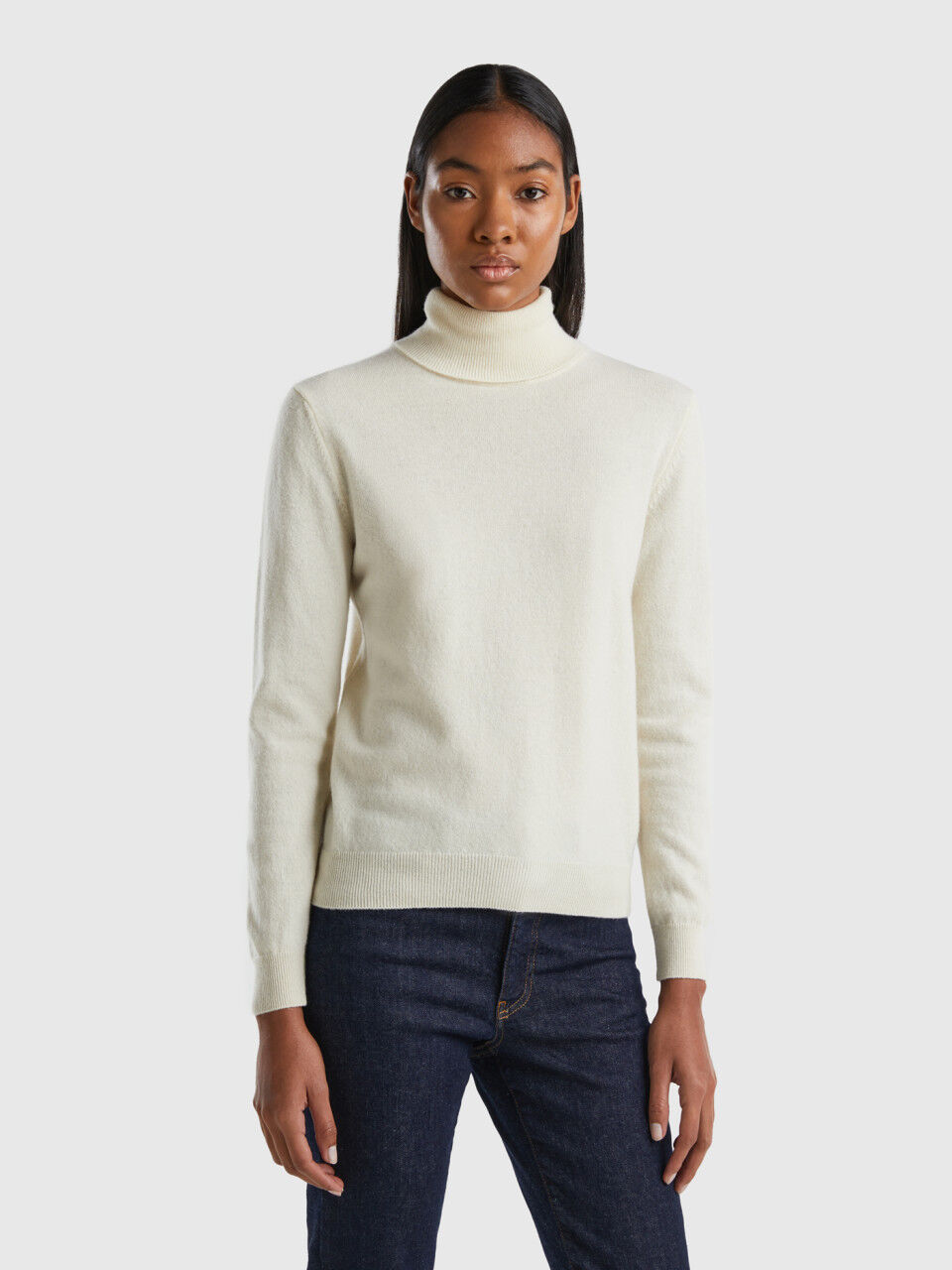 Cream turtleneck sweater in pure Merino wool