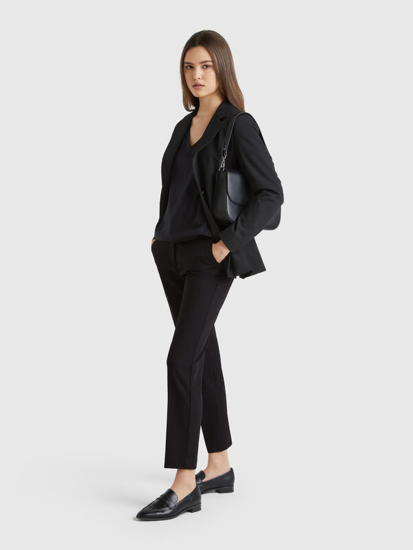 Flowy slim fit trousers Women