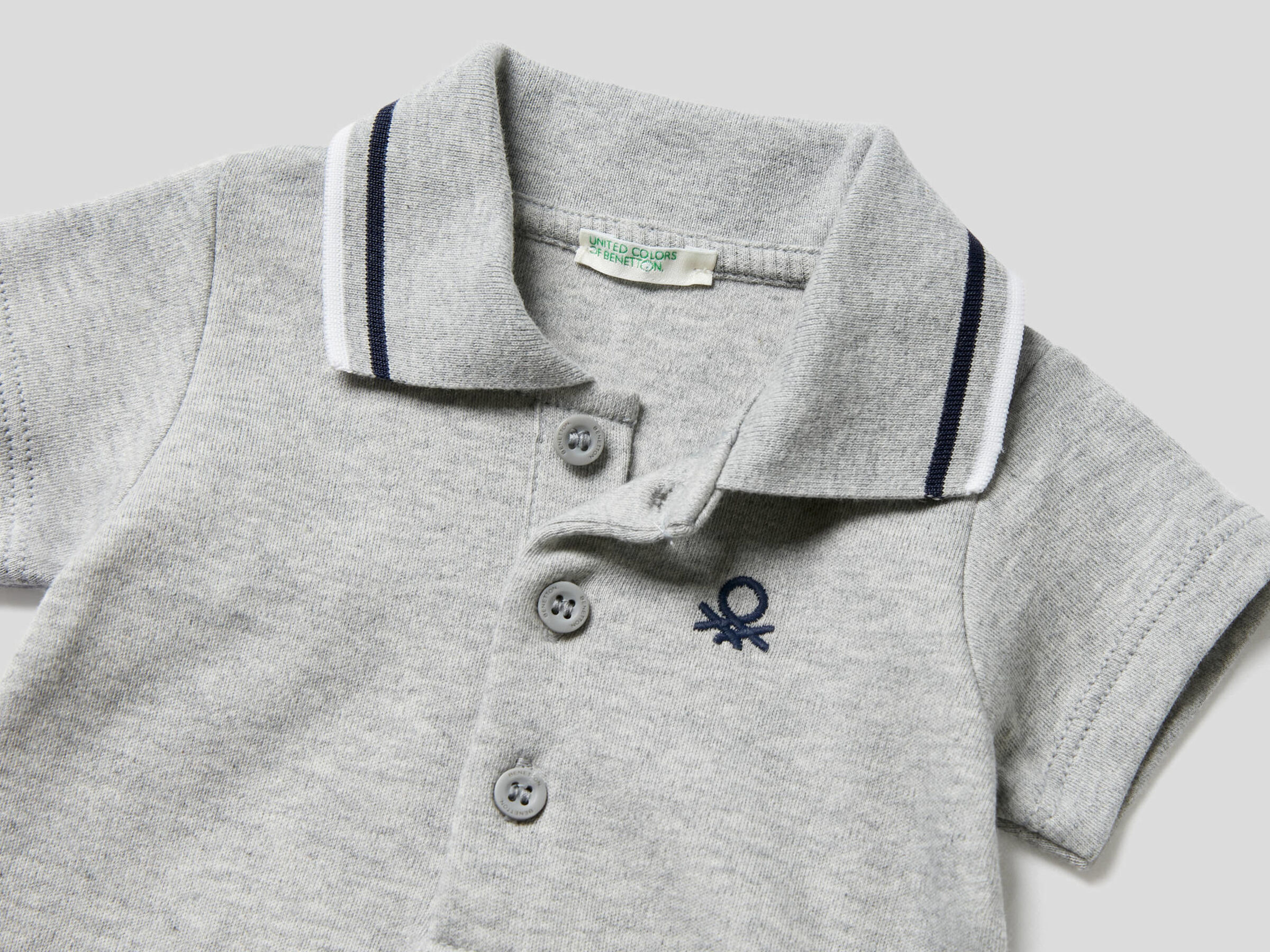 white polo onesie