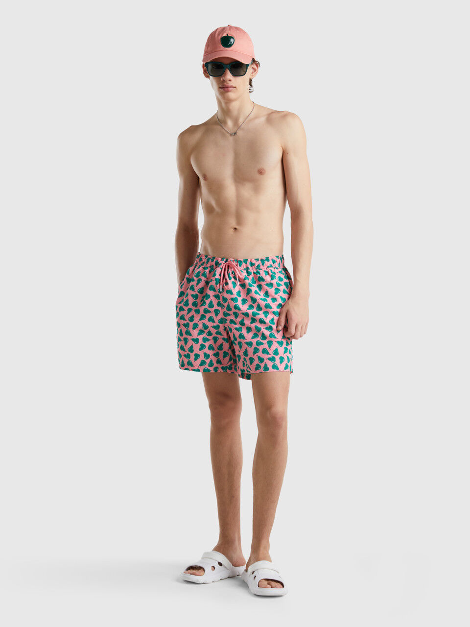 Pink swim trunks with pear pattern