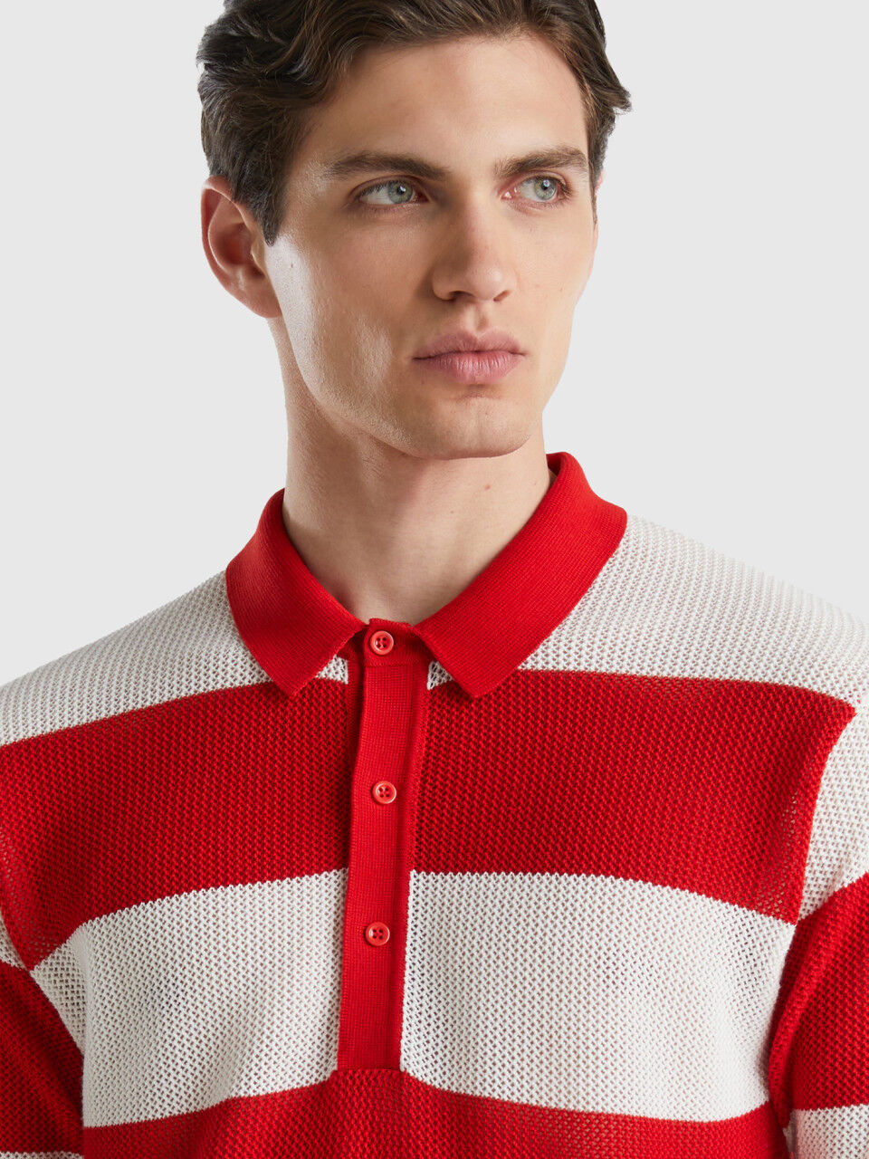 Red and white striped knit polo