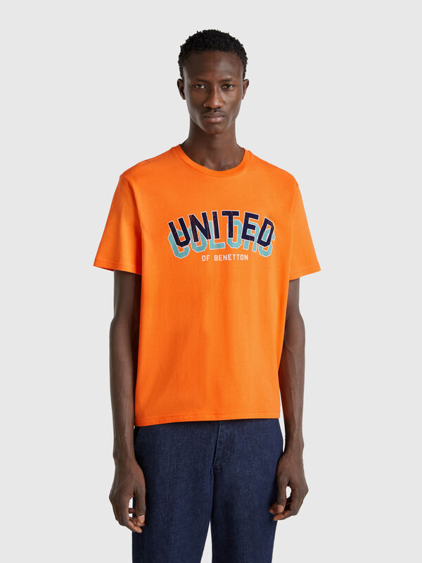 Orange cotton T-shirt with dark blue logo Men