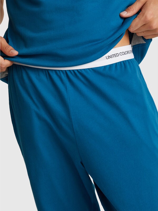 Trousers with elastic logo Men